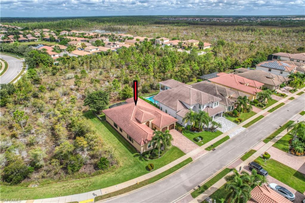3200 Atlantic Circle Naples, FL 34119 - Photo 39 of 41 a view of a lake with an ocean view