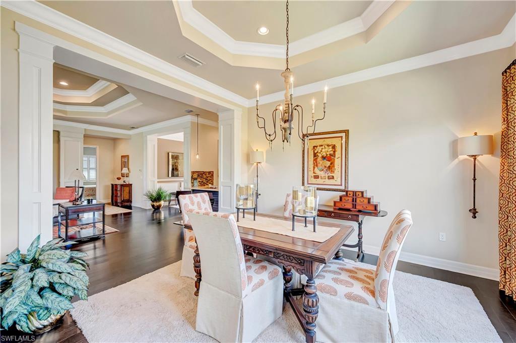 3200 Atlantic Circle Naples, FL 34119 - Photo 7 of 41 a view of a dining room with furniture