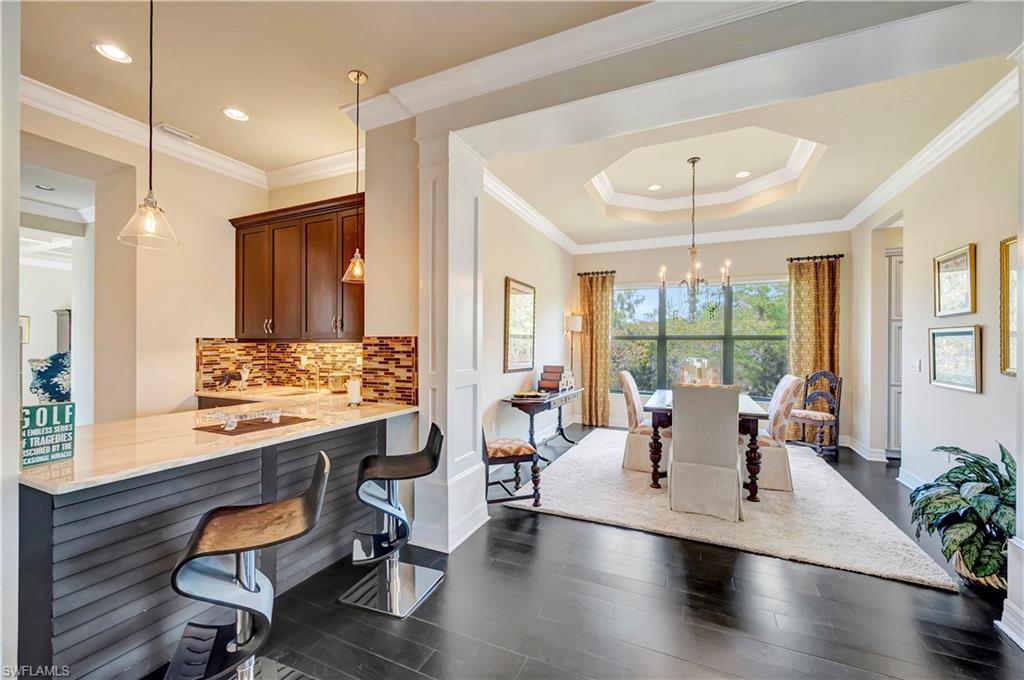 3200 Atlantic Circle Naples, FL 34119 - Photo 10 of 41 a living room with furniture and wooden floor