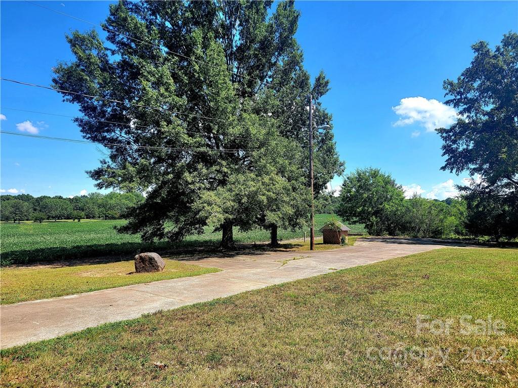 3100 Old Monroe Marshville Road Wingate, NC 28174 - Photo 14 of 15 a view of a swimming pool and lake