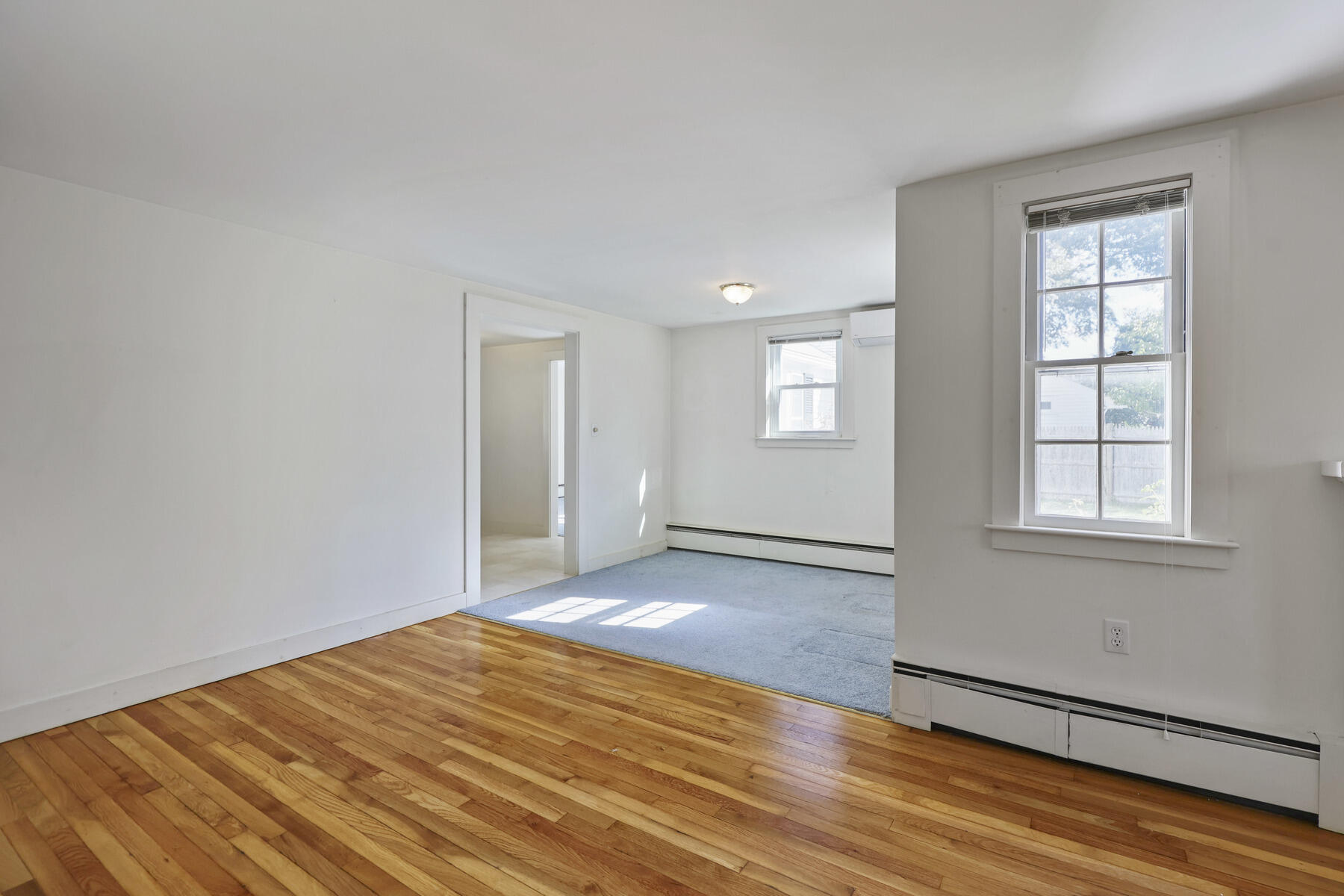 30 Davis Road Falmouth, MA 02540 - Photo 15 of 38 an empty room with wooden floor and windows