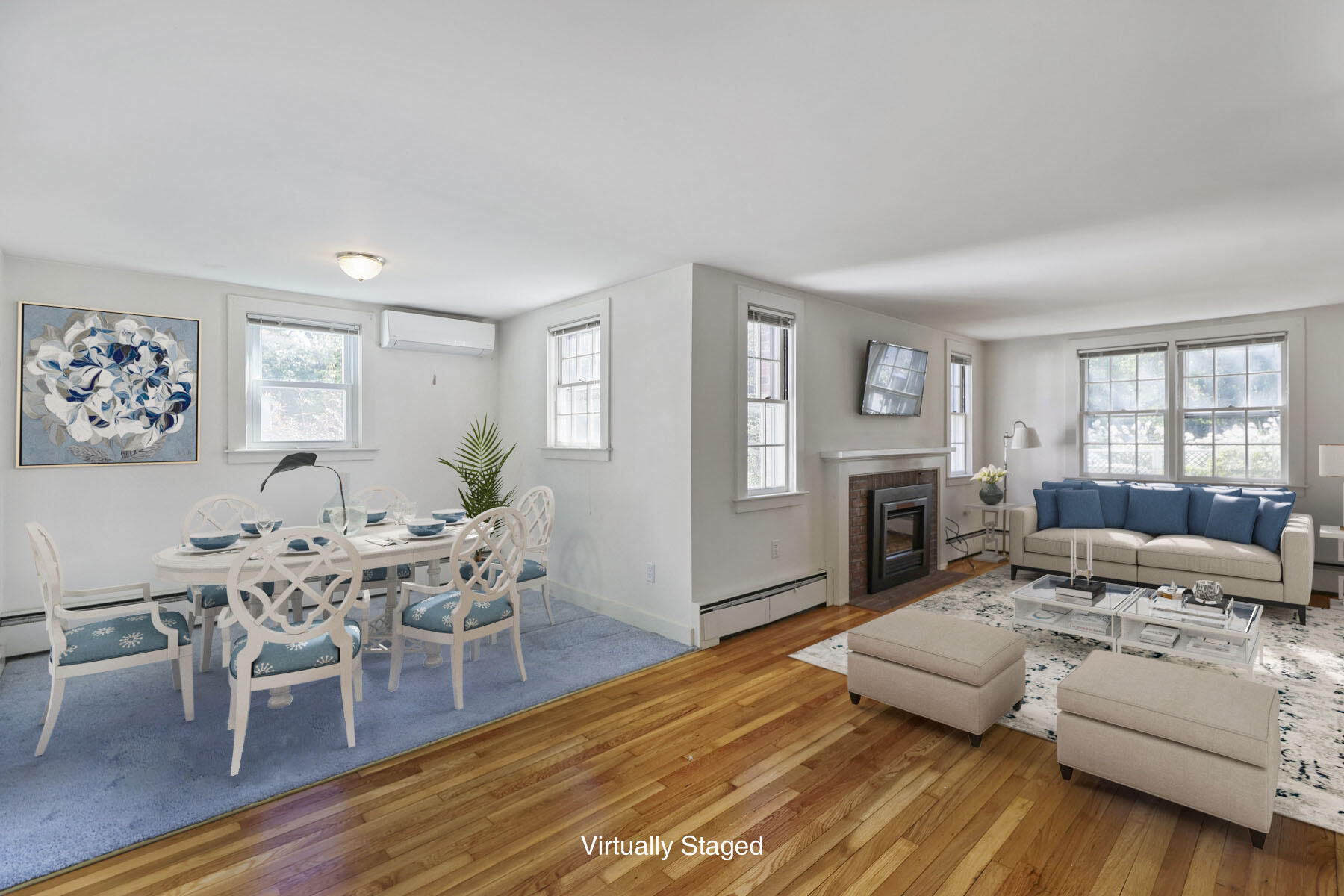30 Davis Road Falmouth, MA 02540 - Photo 16 of 38 a living room with furniture wooden floor and a fireplace
