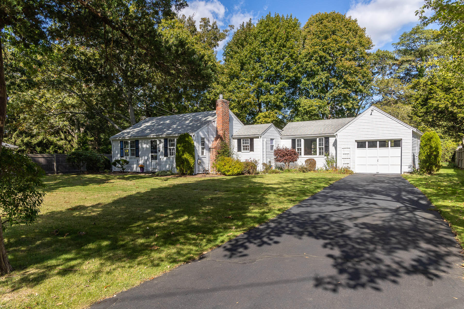 30 Davis Road Falmouth, MA 02540 - Photo 2 of 38 a front view of a house with garden