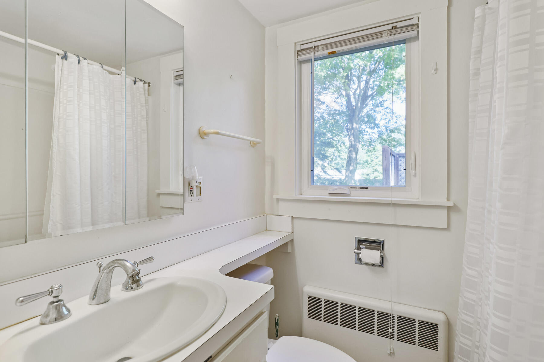 30 Davis Road Falmouth, MA 02540 - Photo 27 of 38 a bathroom with a sink and a mirror