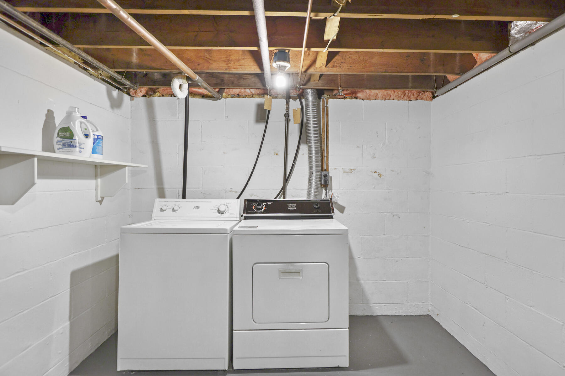 30 Davis Road Falmouth, MA 02540 - Photo 31 of 38 a view of storage and utility room with washer and dryer
