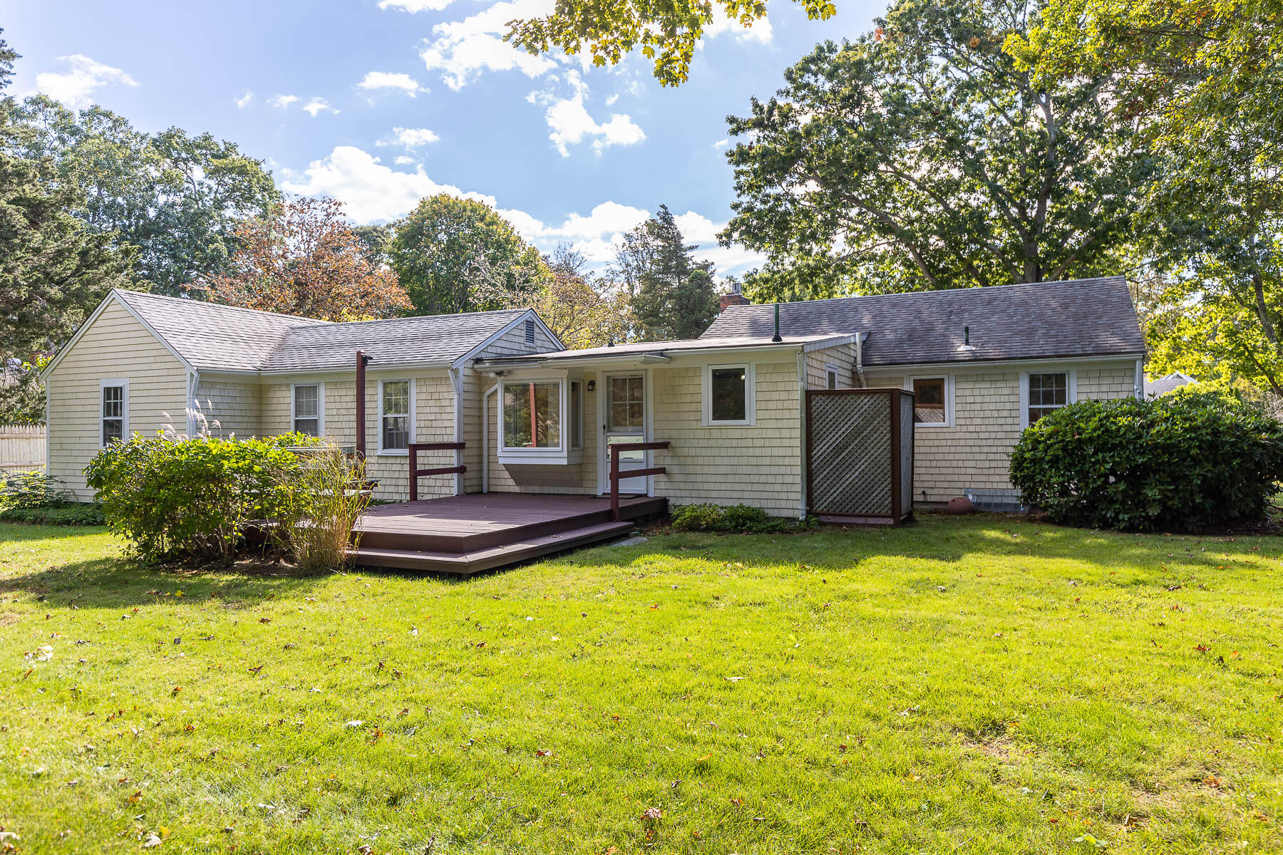 30 Davis Road Falmouth, MA 02540 - Photo 5 of 38 a view of a house with swimming pool and a yard