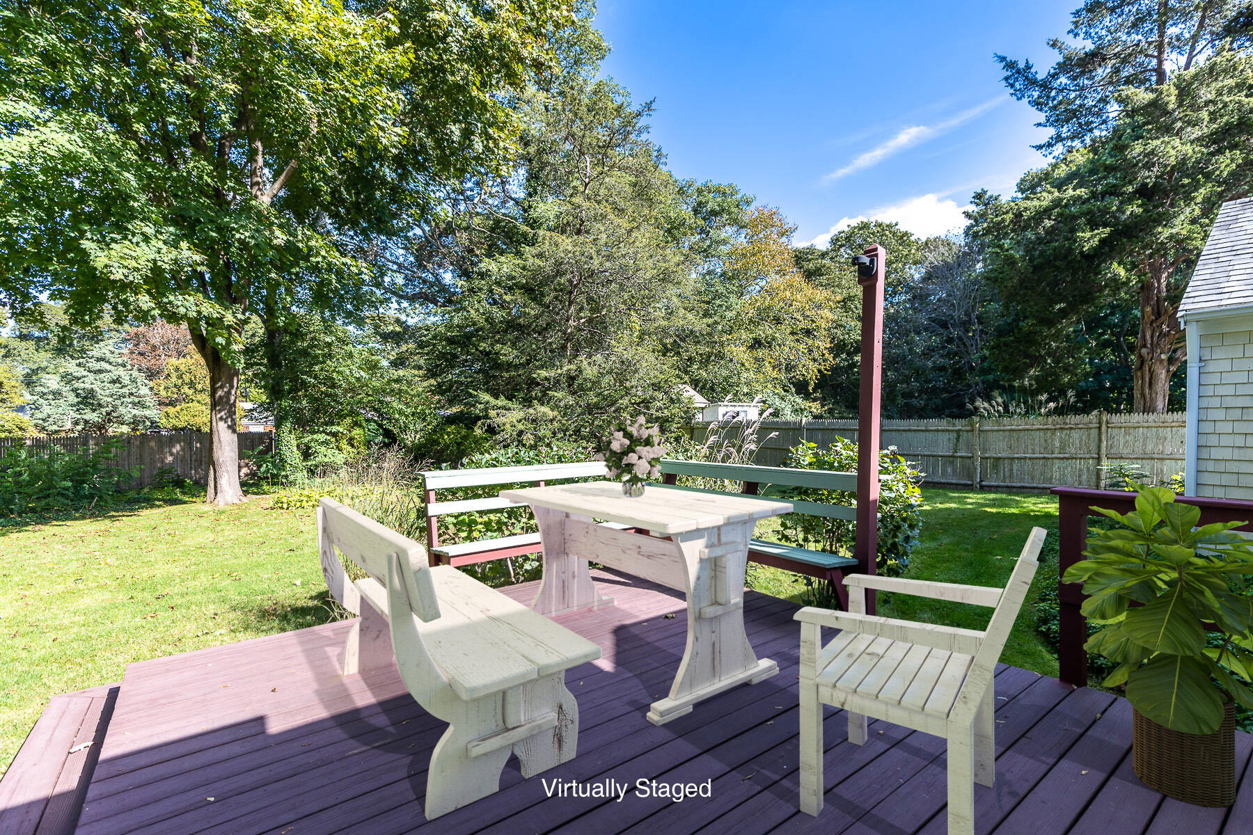 30 Davis Road Falmouth, MA 02540 - Photo 6 of 38 a view of a chair and table in the garden