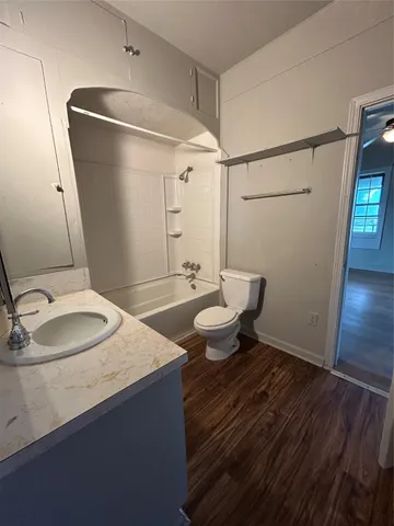 a bathroom with a sink and mirror