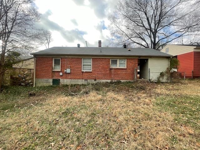 3602 Hallbrook Street Memphis, TN 38127 - Photo 12 of 12 Rear view of property with brick siding and crawl space