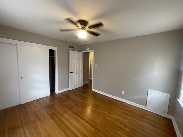 3602 Hallbrook Street Memphis, TN 38127 - Photo 7 of 12 Unfurnished bedroom featuring a closet, wood finished floors, and ceiling fan