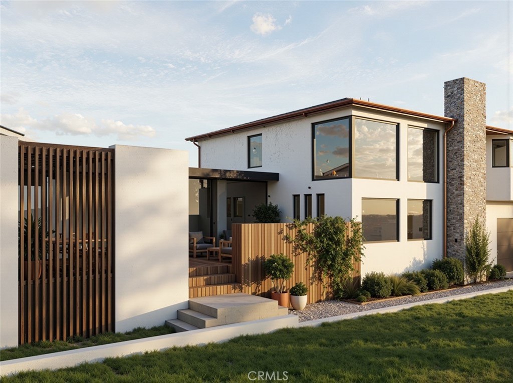 247 Fairview Street Laguna Beach, CA 92651 - Photo 2 of 18 a view of a house with backyard and a tree