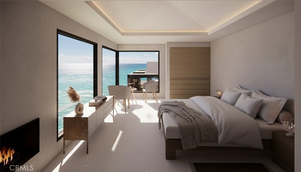 247 Fairview Street Laguna Beach, CA 92651 - Photo 8 of 18 a bedroom with a bed and large windows