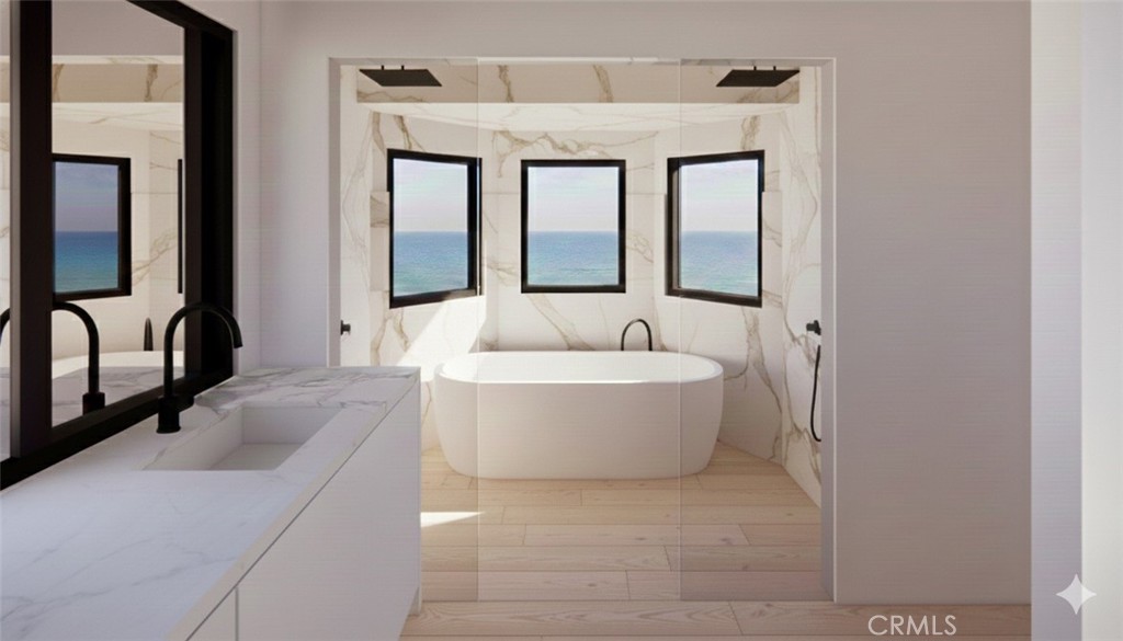 247 Fairview Street Laguna Beach, CA 92651 - Photo 10 of 18 a white bath tub sitting next to a bathroom sink