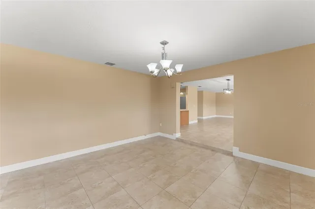 a view of a swimming pool with a yard