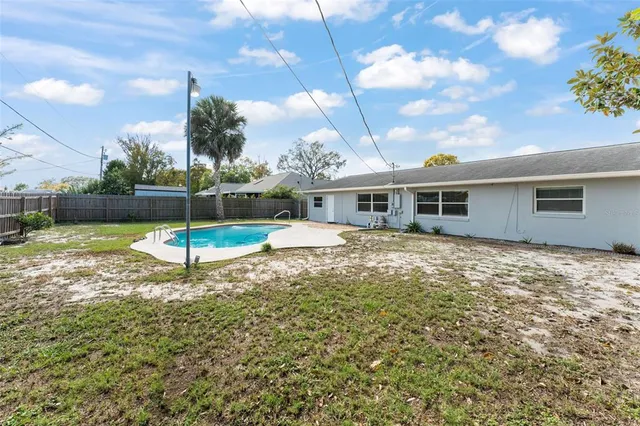 a view of a yard in front of a house