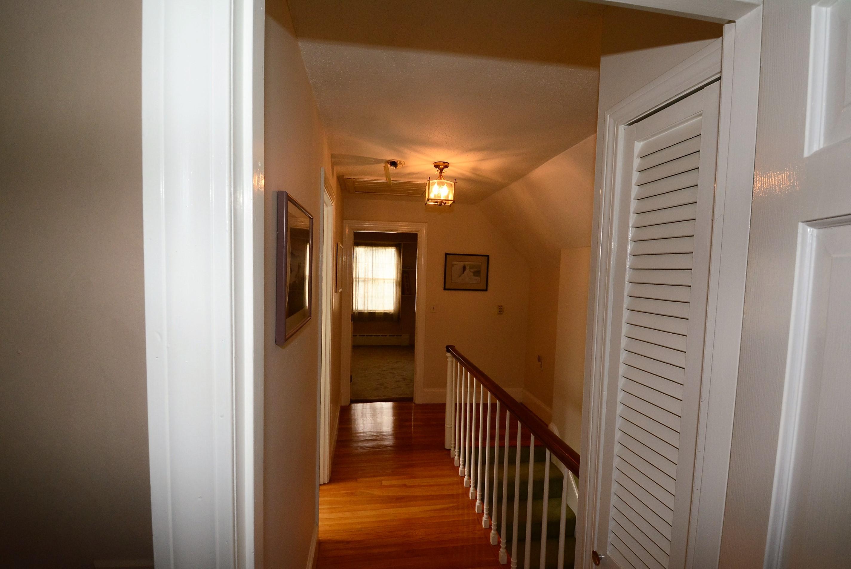 64 Depot Road Cataumet, MA 02534 - Photo 19 of 26 a view of a hallway with a hallway