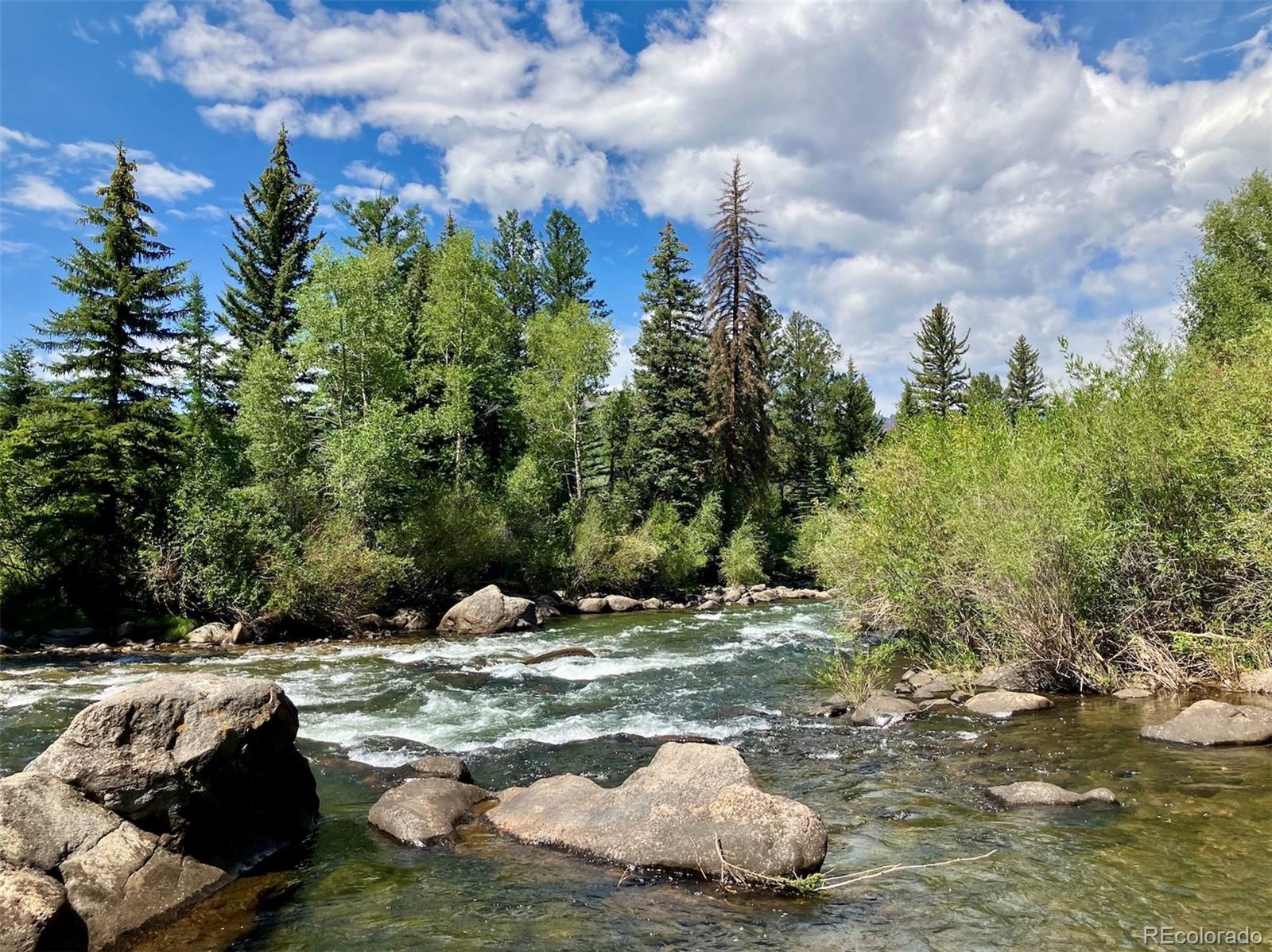 a view of a backyard of the house