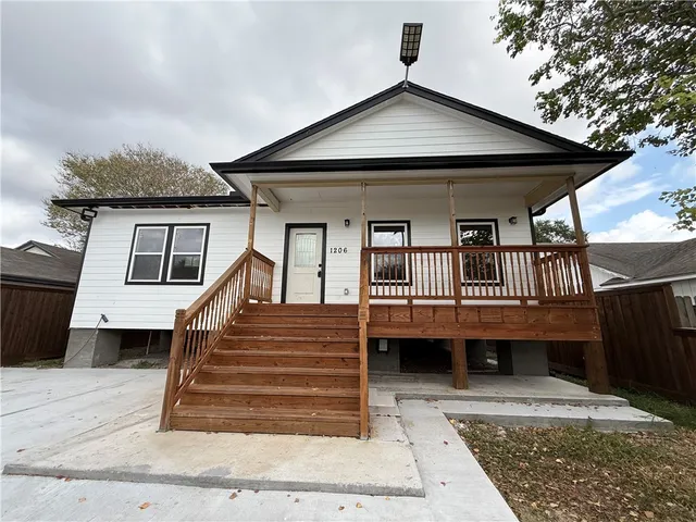 a view of a house with a balcony