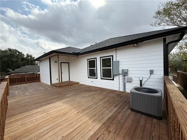 a backyard of a house with seating space