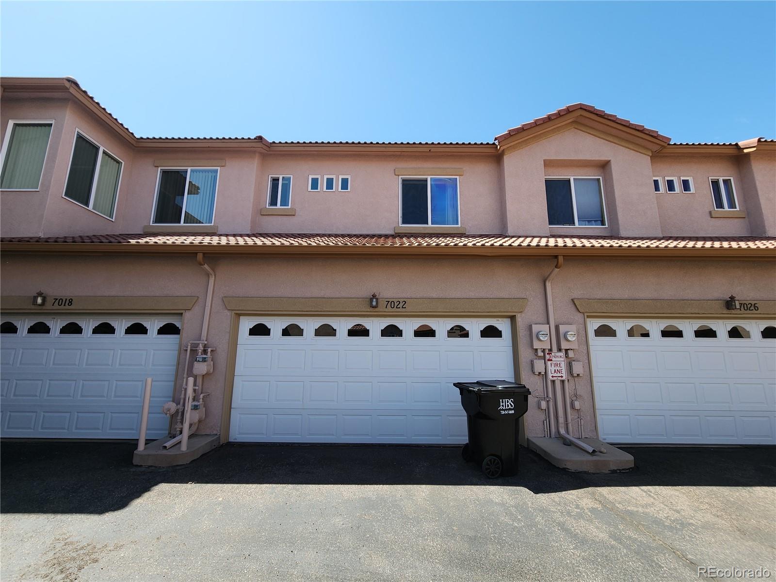 7022 Sand Crest View Colorado Springs, CO 80923 - Photo 16 of 16 a front view of a house