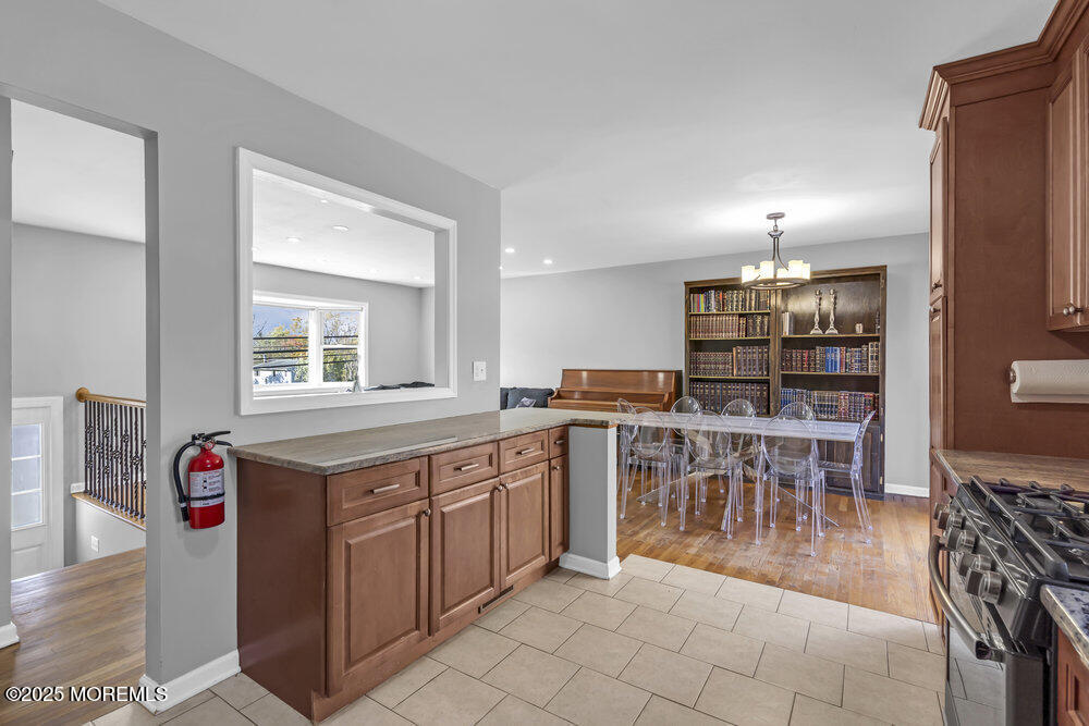117 Manhattan Street Jackson, NJ 08527 - Photo 13 of 31 a kitchen with a table and chairs