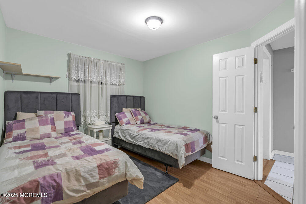 117 Manhattan Street Jackson, NJ 08527 - Photo 17 of 31 a bedroom with two beds and a dresser