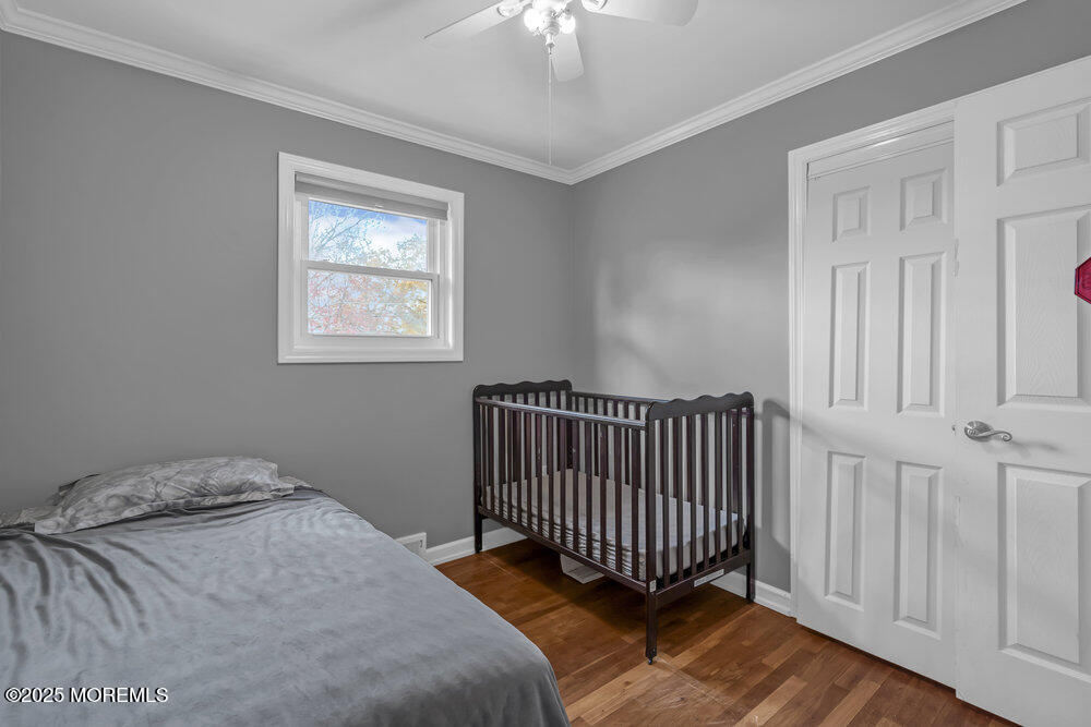 117 Manhattan Street Jackson, NJ 08527 - Photo 19 of 31 a bedroom with a bed and a window