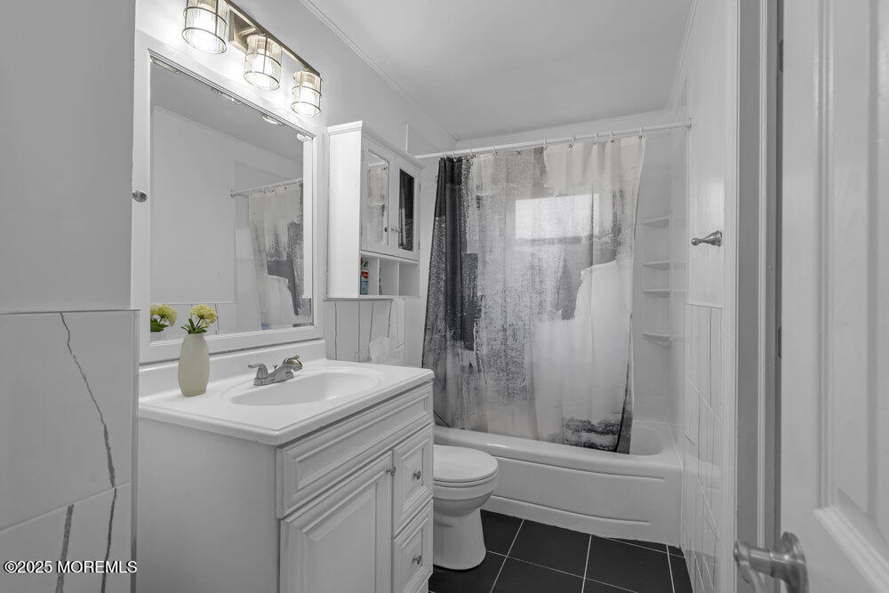 117 Manhattan Street Jackson, NJ 08527 - Photo 23 of 31 a bathroom with a sink toilet and shower