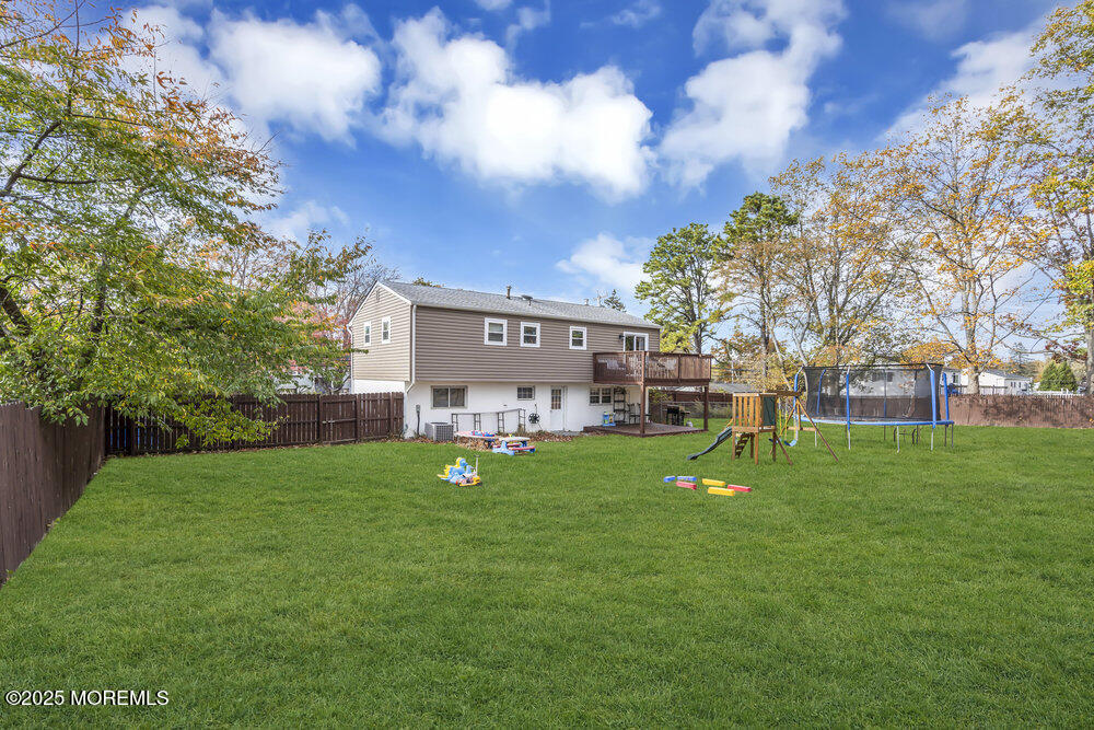 117 Manhattan Street Jackson, NJ 08527 - Photo 30 of 31 a view of a house with a backyard