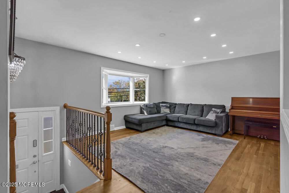 117 Manhattan Street Jackson, NJ 08527 - Photo 6 of 31 a living room with furniture and a couch