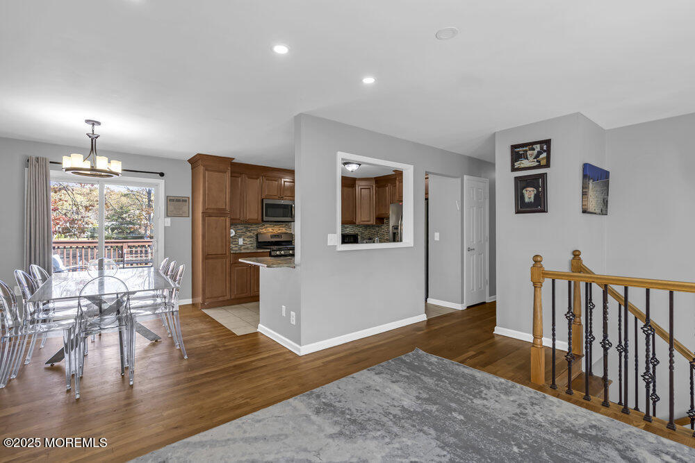 117 Manhattan Street Jackson, NJ 08527 - Photo 8 of 31 a livingroom with furniture wooden floor and a rug