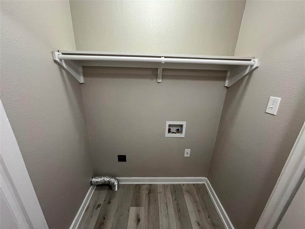 3006 Chiesa Road Rowlett, TX 75088 - Photo 14 of 33 a view of a room with rack on the wall