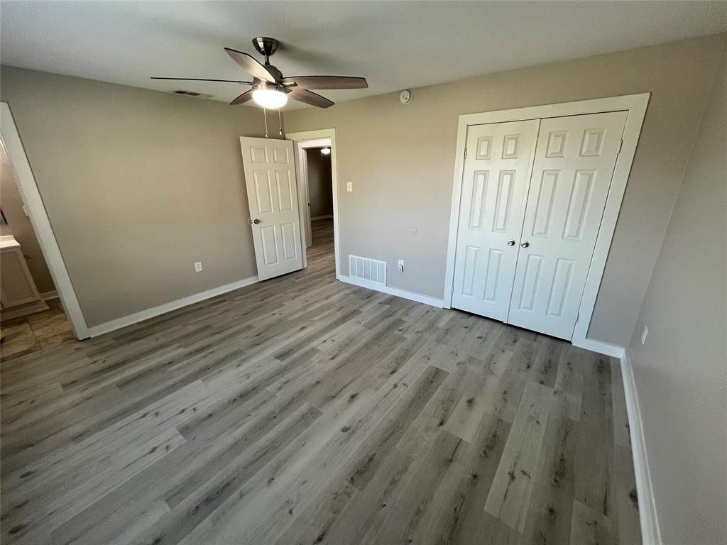 3006 Chiesa Road Rowlett, TX 75088 - Photo 16 of 33 wooden floor in an empty room