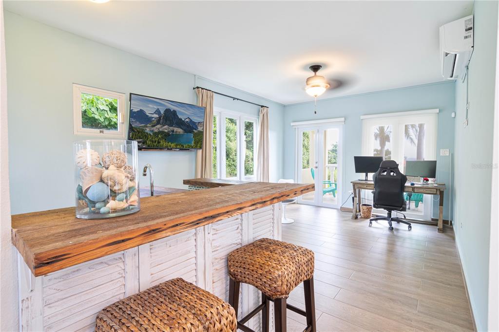 53 Shell Castle Road Humacao, Humacao 00791 - Photo 8 of 22 a living room with furniture and a table