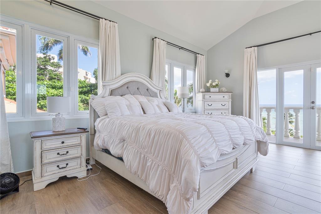 53 Shell Castle Road Humacao, Humacao 00791 - Photo 10 of 22 a bedroom with a bed and a dresser