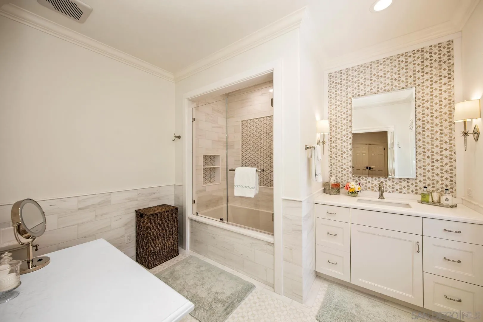 6003 La Flecha Rancho Santa Fe, CA 92067 - Photo 23 of 32 a bathroom with a sink and a mirror