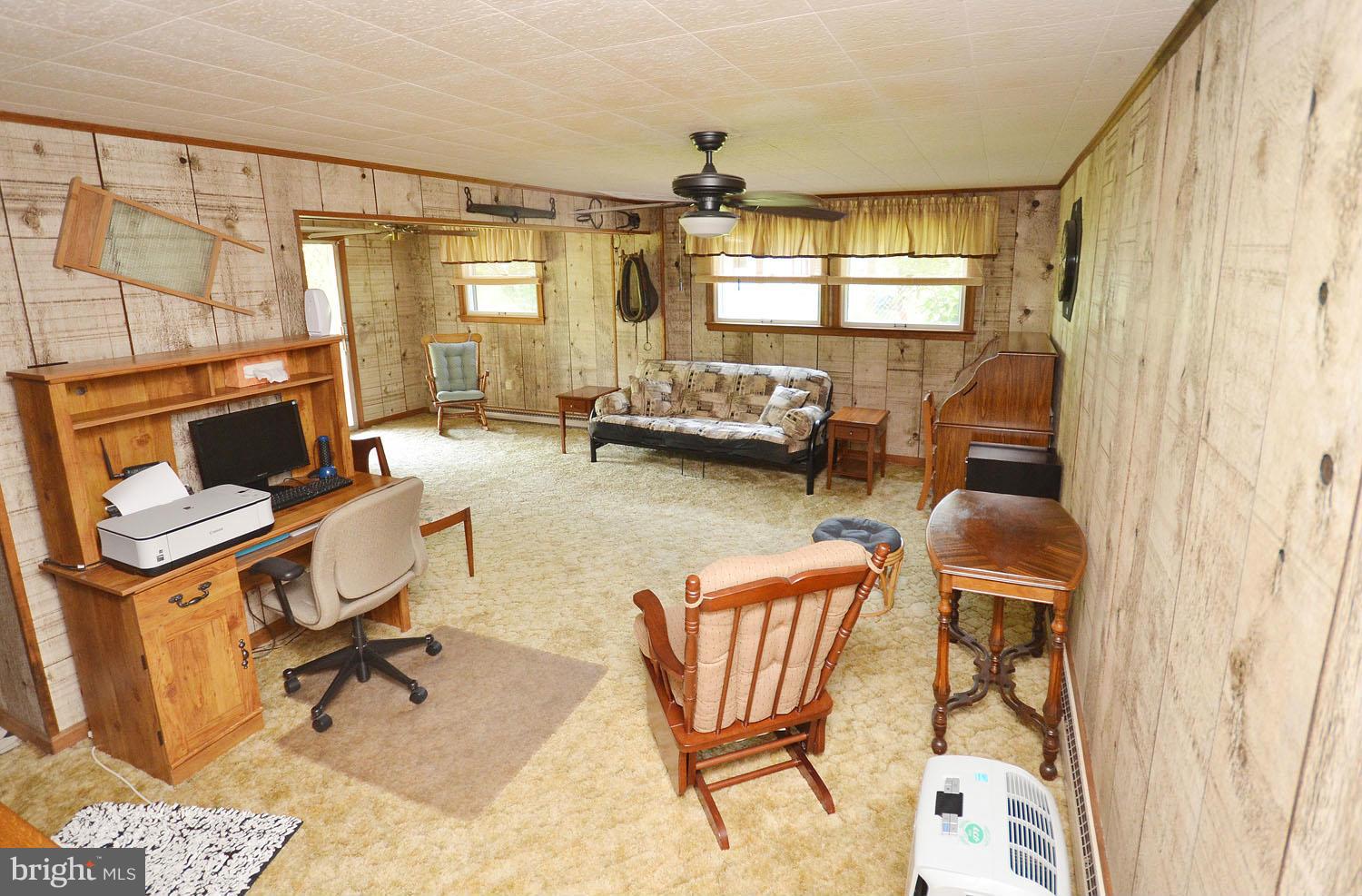 1008 South Hoga Road Sterling, VA 20164 - Photo 23 of 30 a living room with furniture and a window