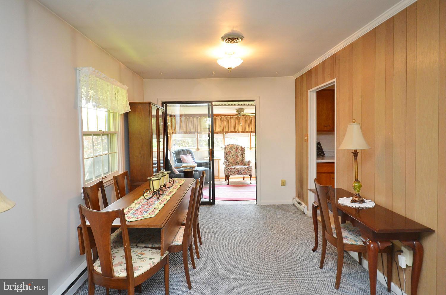1008 South Hoga Road Sterling, VA 20164 - Photo 10 of 30 a dining room with furniture window and outside view