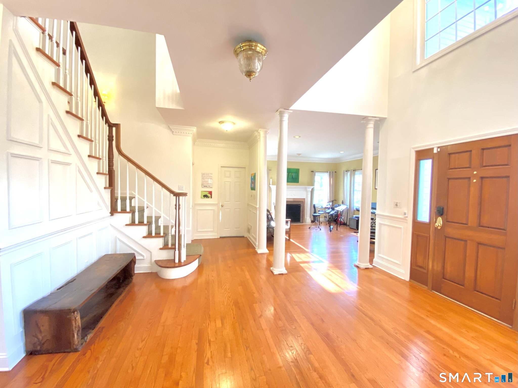 12 Carriage Hill Road Woodbridge, CT 06525 - Photo 10 of 24 a view of a living room and dining room