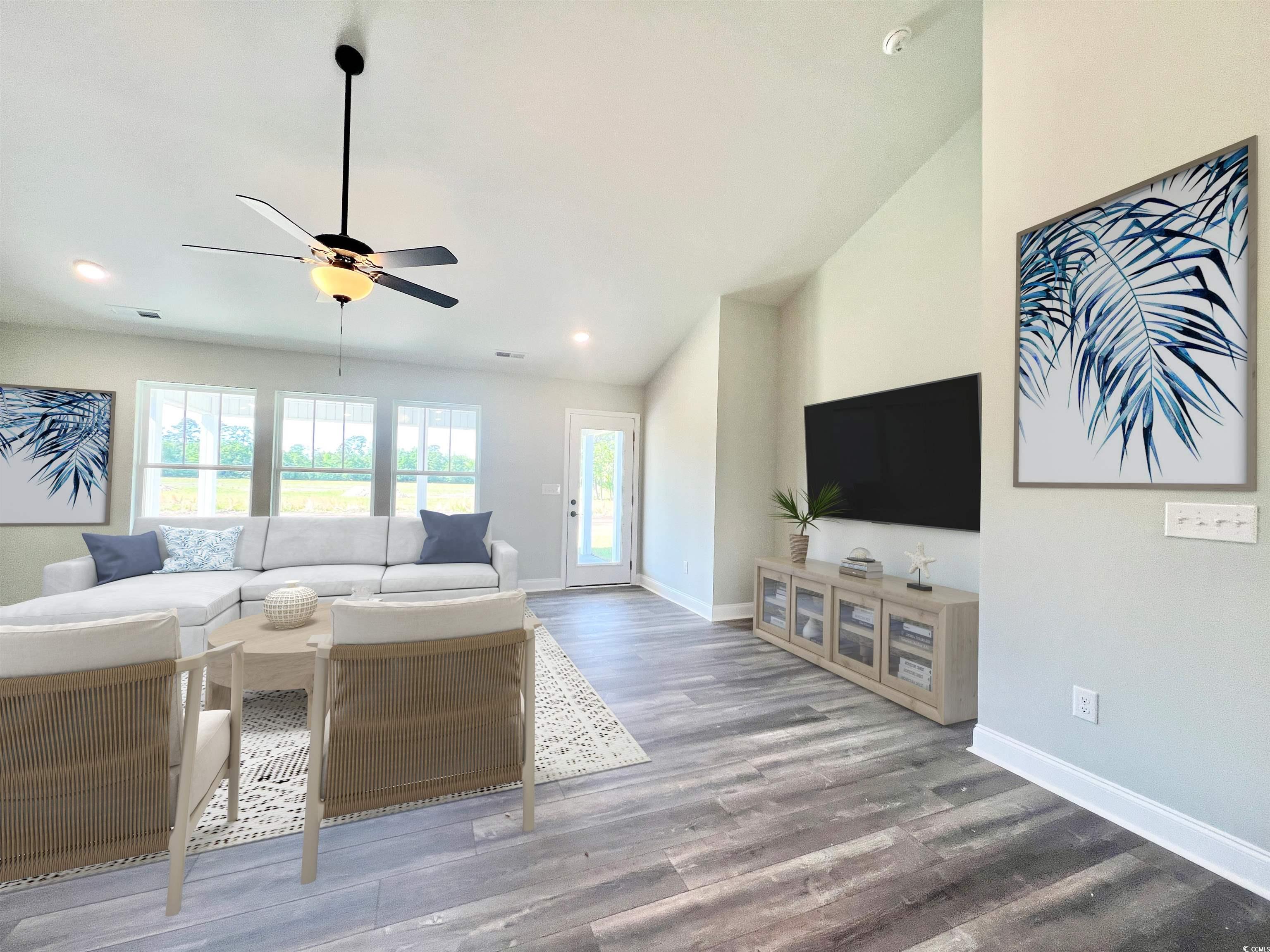 1174 Daisy Road Loris, SC 29569 - Photo 5 of 33 Living room with wood-laminate floors, ceiling fan