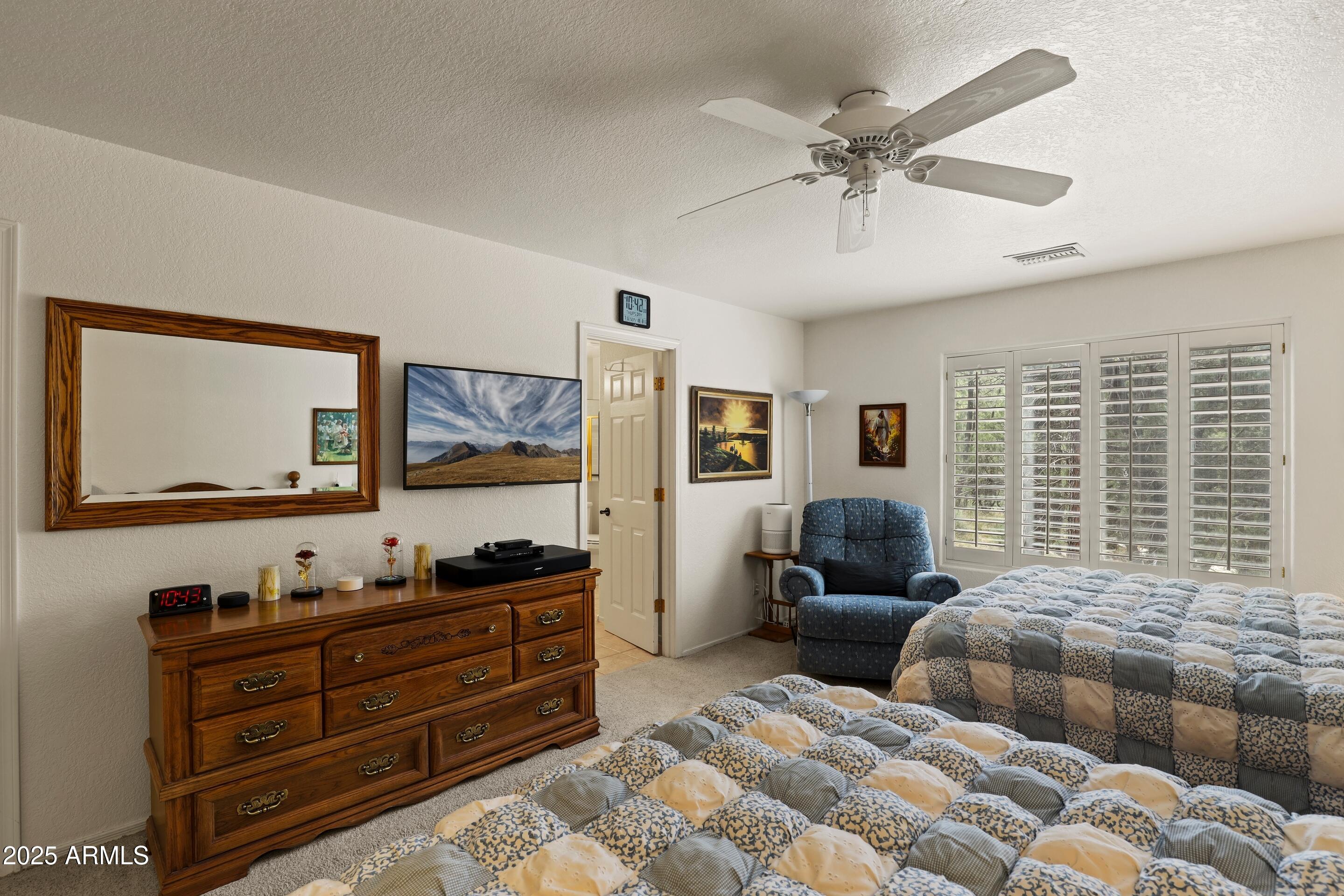 269 Homestead Lane Payson, AZ 85541 - Photo 27 of 38 a bedroom with two beds and a window