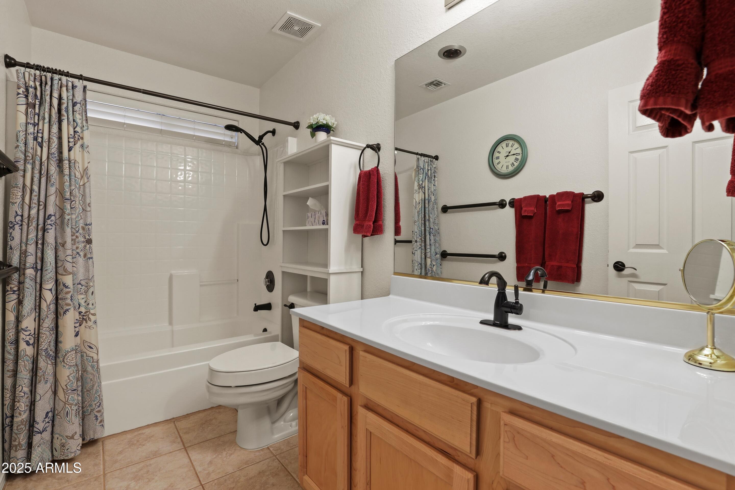 269 Homestead Lane Payson, AZ 85541 - Photo 31 of 38 a bathroom with a sink toilet and shower