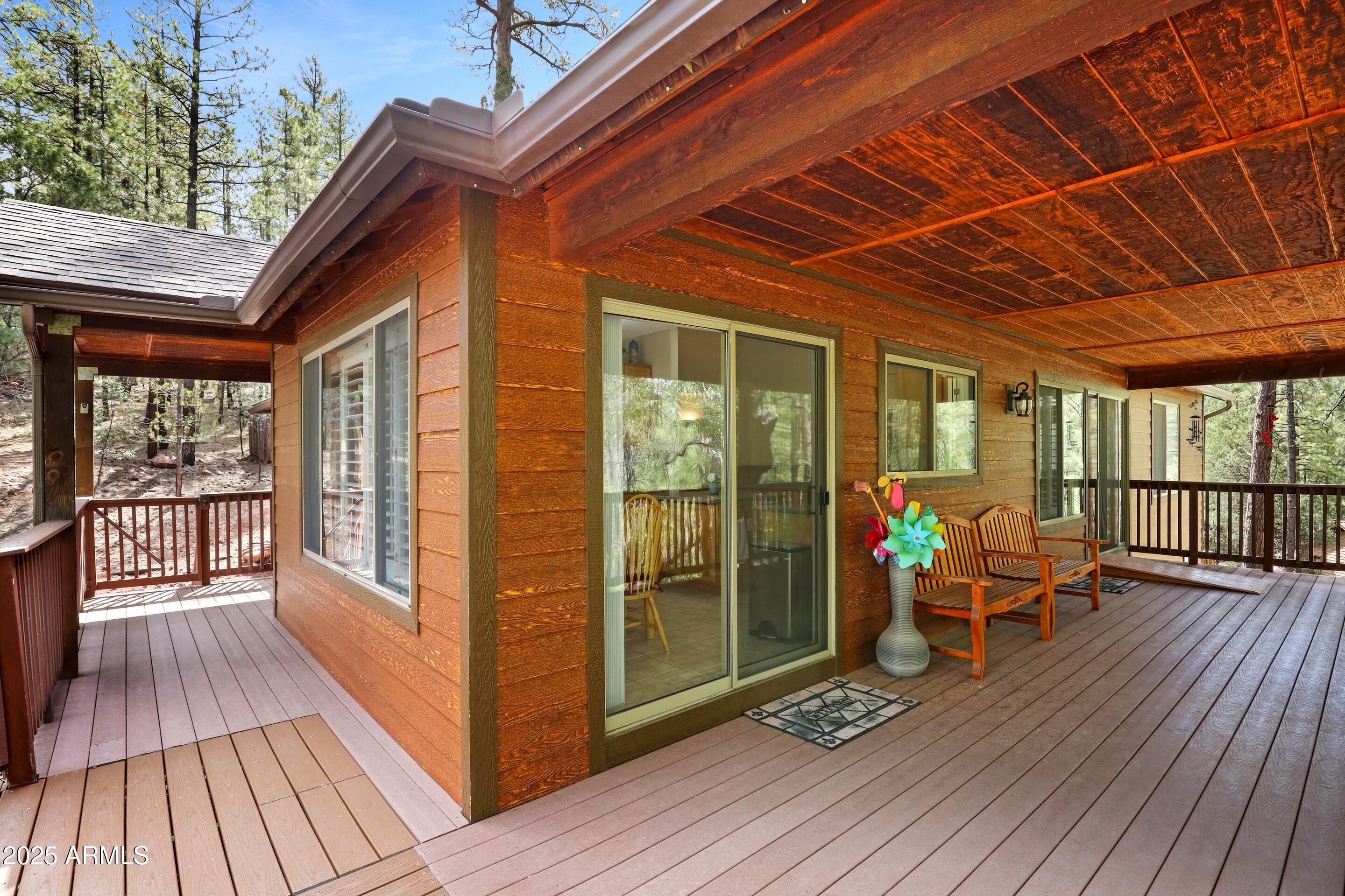 269 Homestead Lane Payson, AZ 85541 - Photo 6 of 38 a balcony with wooden floor and furniture