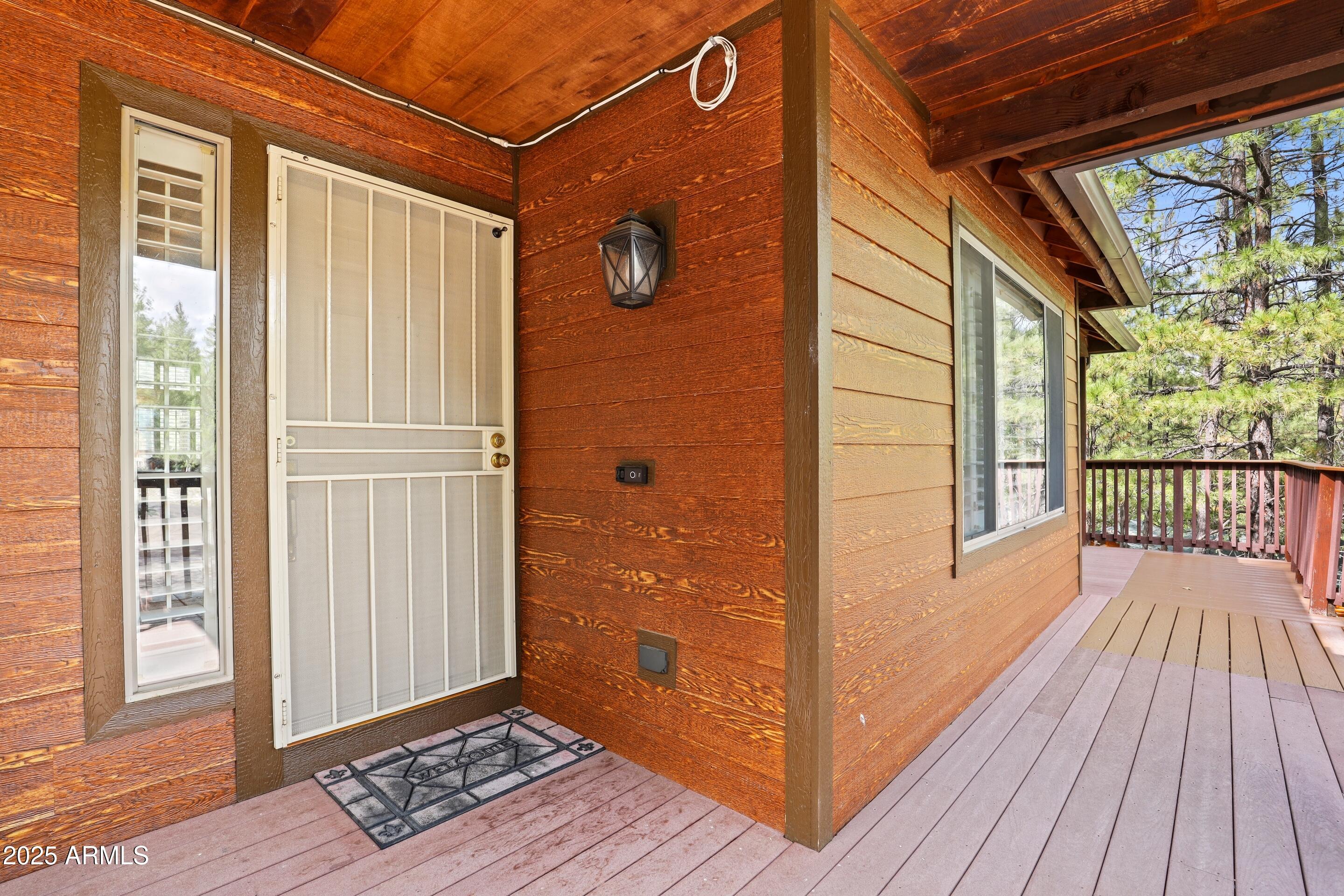 269 Homestead Lane Payson, AZ 85541 - Photo 7 of 38 a view of a balcony with wooden floor and wooden floor