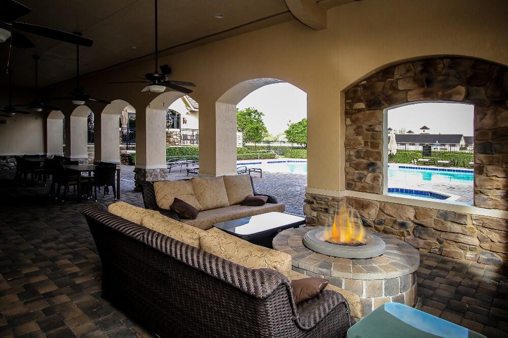 9830 Equus Circle Boynton Beach, FL 33472 - Photo 7 of 90 a living room with furniture and a large window