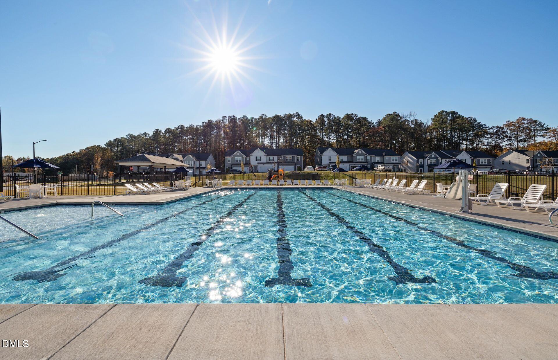 5007 Reader Way Durham, NC 27703 - Photo 25 of 31 a view of a swimming pool and lake view