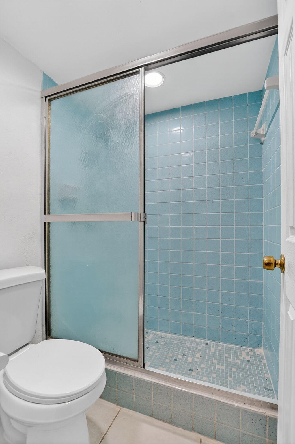 644 Northwest 13th Street, Unit 110 Boca Raton, FL 33486 - Photo 14 of 24 a bathroom with a shower and a toilet