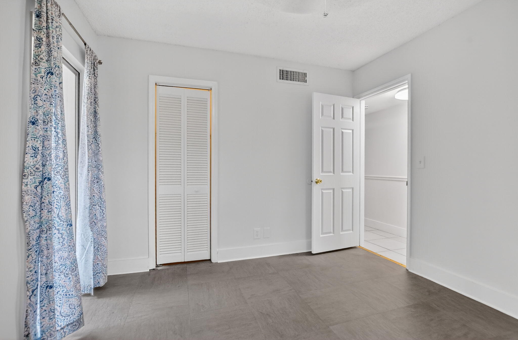 644 Northwest 13th Street, Unit 110 Boca Raton, FL 33486 - Photo 17 of 24 a view of an empty room