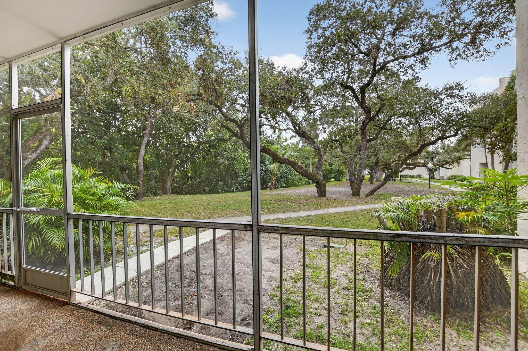 644 Northwest 13th Street, Unit 110 Boca Raton, FL 33486 - Photo 20 of 24 a view of outdoor space with deck