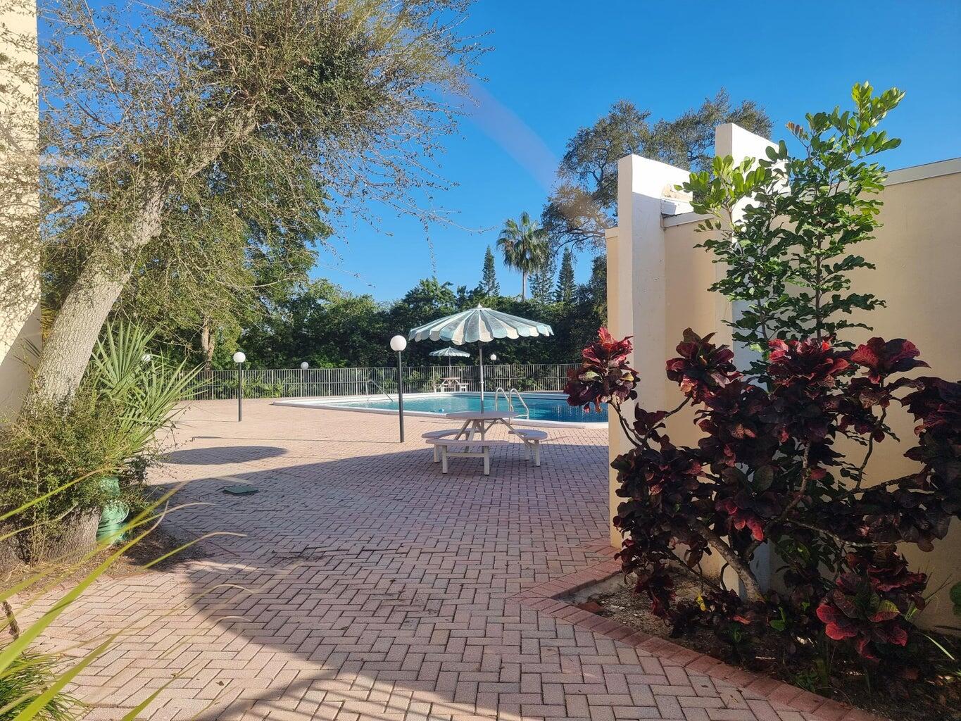 644 Northwest 13th Street, Unit 110 Boca Raton, FL 33486 - Photo 24 of 24 a view of a backyard